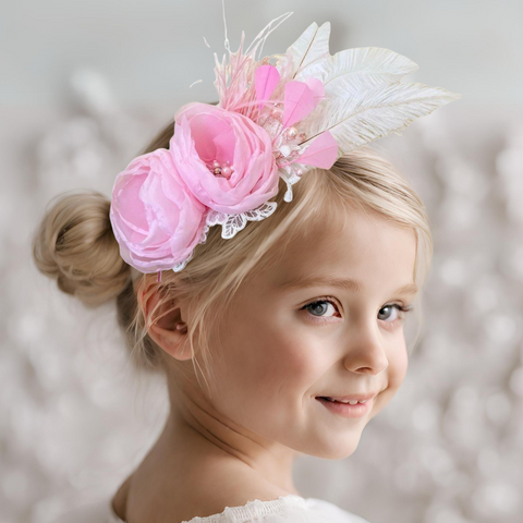 Buy the best elegant childs pink organza, pearl, crystal, lace and feather fascinator headband.  This pieces is entirely handmade by sienna Likes to Party, making it the most beautiful bespoke girls headpiece perfect for special occasions.