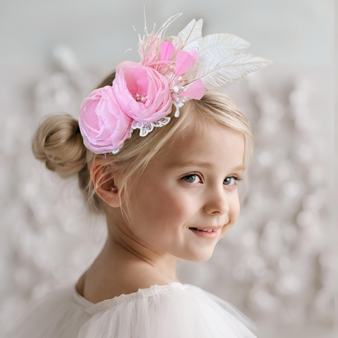 buy the most elegant girls hair accessory in pink.  This luxury childs fascinator headband is entirely hand crafted.  Flowers are created in pink organza, lace, crystals and pearls.  Perfect special occasion or bridal accessory.