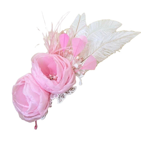 Buy best childrens pink feather headpiece.  This organza, pearls, crystal and feather fascinator headband is entirely handcrafted by Sienna Likes to Party luxury hair accessories or children