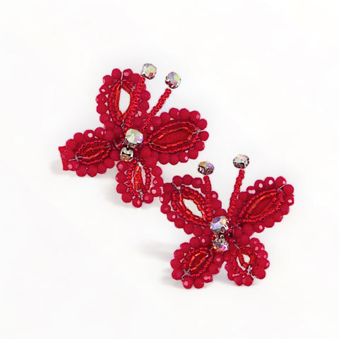 The most adorable handcrafted butterfly hair clip set for babies and toddlers.  Each hair adornment is handmade with ruby red cut crystals and diamante by Sienna Likes to Party Luxury Accessories for Children