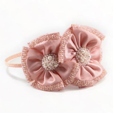 Buy best designer kids hair accessories, perfect for flower girls, bridal, or special occasions.  Create with pastel apricot satin and hand stitched with hundreds of ctystals and pearls.