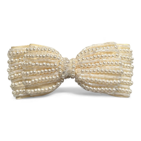 best girls designer hair bow handcrafted with pearls and crystal.  Perfect for childs special celebrations.