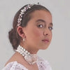 buy elegant, bespoke designer hair accessories for children.  The Sachi pearl and crystal headband is uniquely handmade to create the most beatiful flower girl or childs milestone gift to treasure forever.