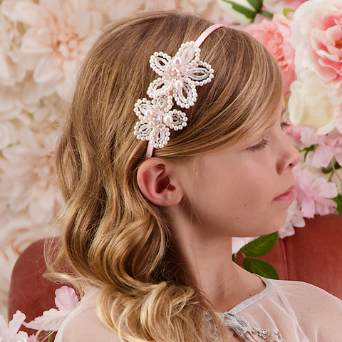 Girls handcrafted bespoke crystal and pearl Flower Headband in pink for special occasionwear, weddings or flower girls.  Each piece designed and handmade by Sienna Likes to Party, best luxury hair accessories for Children