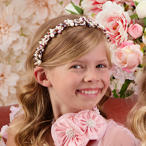 Luxury handmade childrens pearl hair accessories.  The Sachi is elegantly handcrafted with pink pearls and crystals to create the perfect flower girl hair accessory or hair adornment for a childs special occasion.