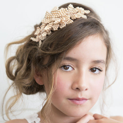 Buy bridal flower crowns for flower girls. 
 Princess of Pearls Designer Headband is entirely handcrafted with individual flowers made from gold pearls and blush crystals.  Designed by Sienna Likes to Party