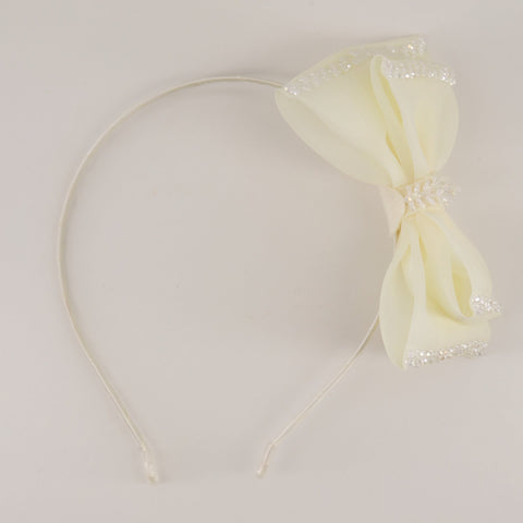 The Wonderland Designer Hair Bow Headband.